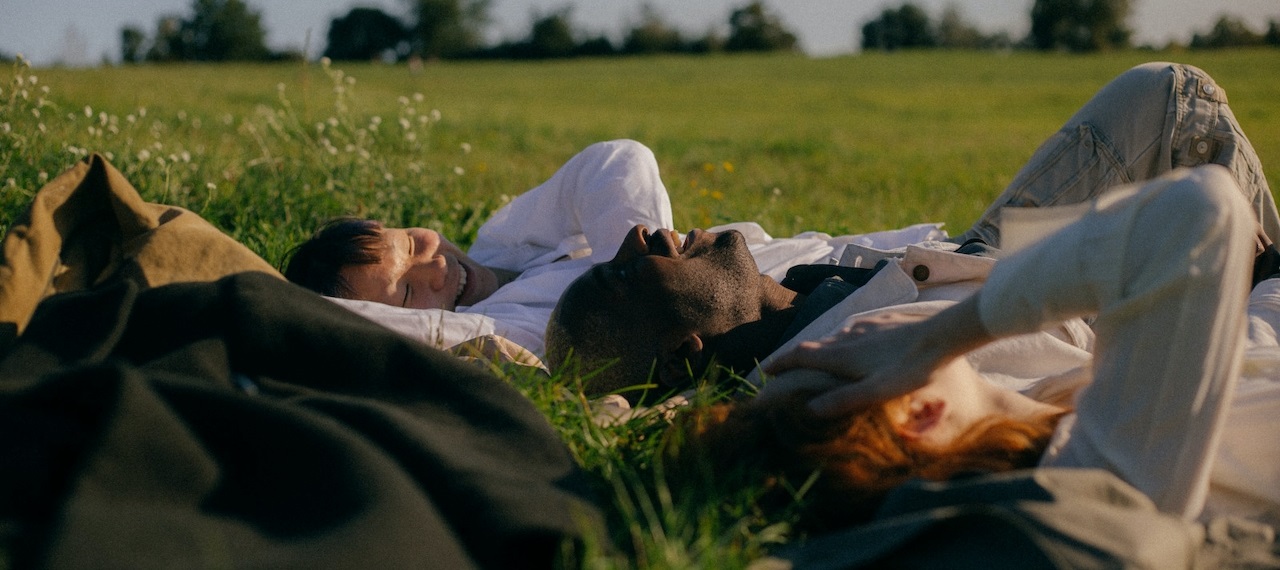 People lying down looking up at the sky